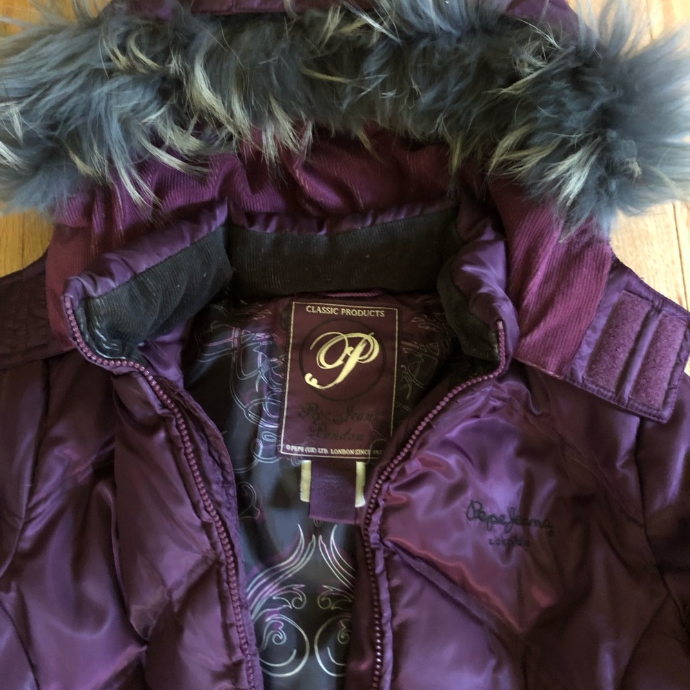 Long purple puffer (down) coat. Feather hood.